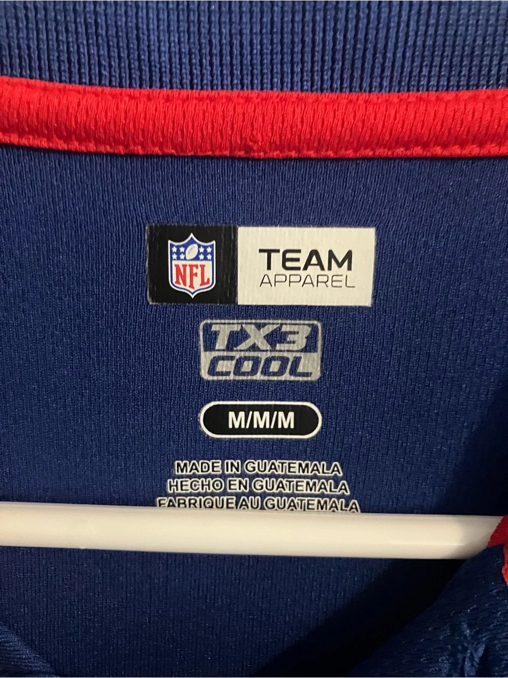 Youth New York Giant’s Royal Blue Polo with Red Side Panels Size M